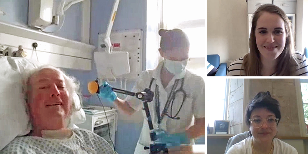 Video call screenshot of man in hospital bed being helped by nurse