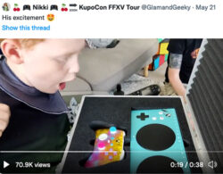 Screenshot of social post: young boy looking at unboxing of controller