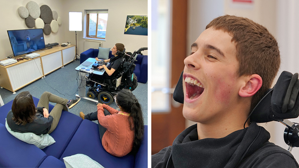 Group sitting around young man playing video game with adapted controller, and close-up of man's smiling face